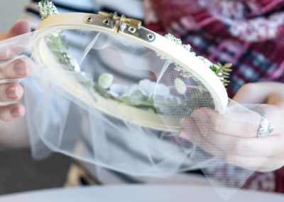 hands holding embroidery hoop