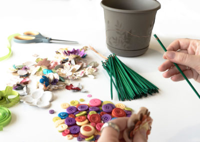 tying wire to stem for flower buttons
